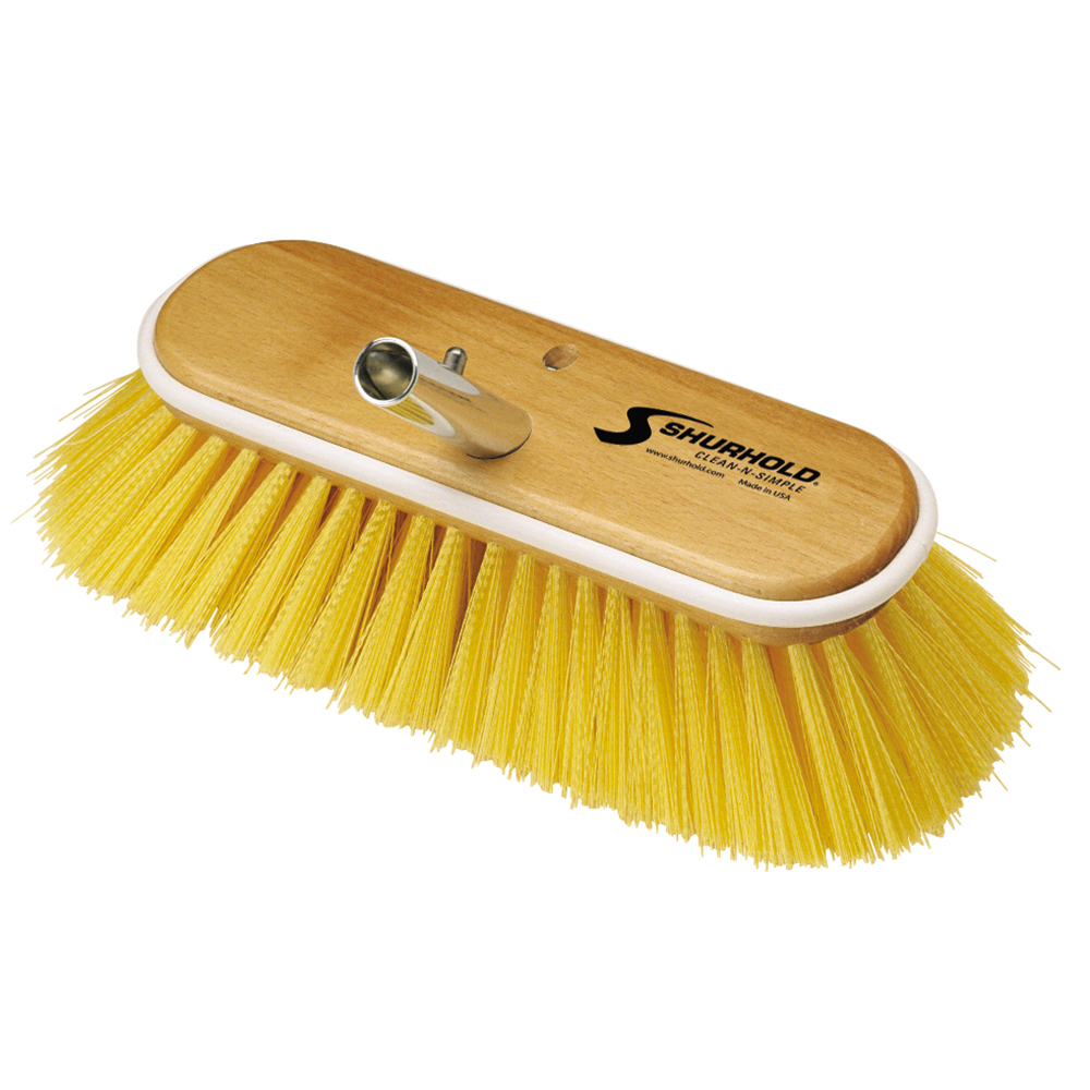 Yellow bristle brush with wooden handle.