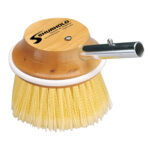 Round brush with wooden handle and yellow bristles.