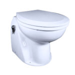 White ceramic toilet with closed lid.