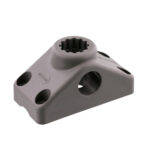 Gray plastic component with multiple holes and slots.