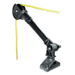 Black pulley system with yellow rope attached.