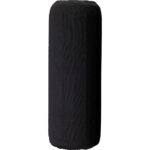 Black cylindrical punching bag for martial arts training.