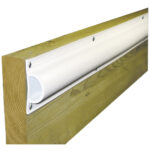 White vinyl dock bumper on wood beam