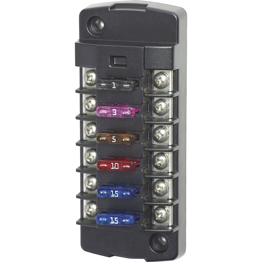 Automotive fuse block with colorful fuses installed.