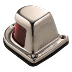 Stainless steel boat navigation light with red lens.