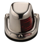 Stainless steel marine navigation light with red lens.