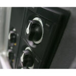 Close-up of rotary switch on control panel.