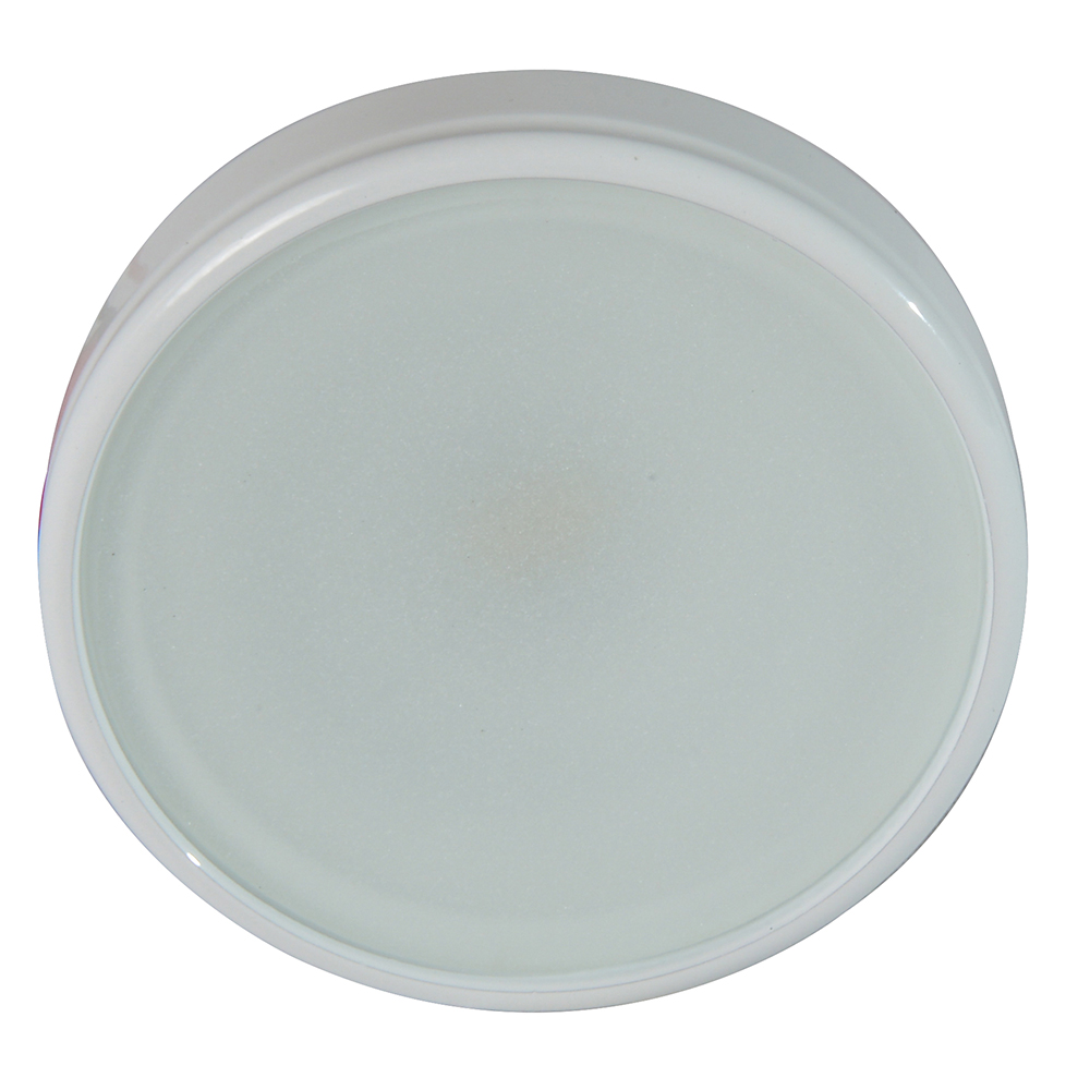 White round plastic container lid, top view.