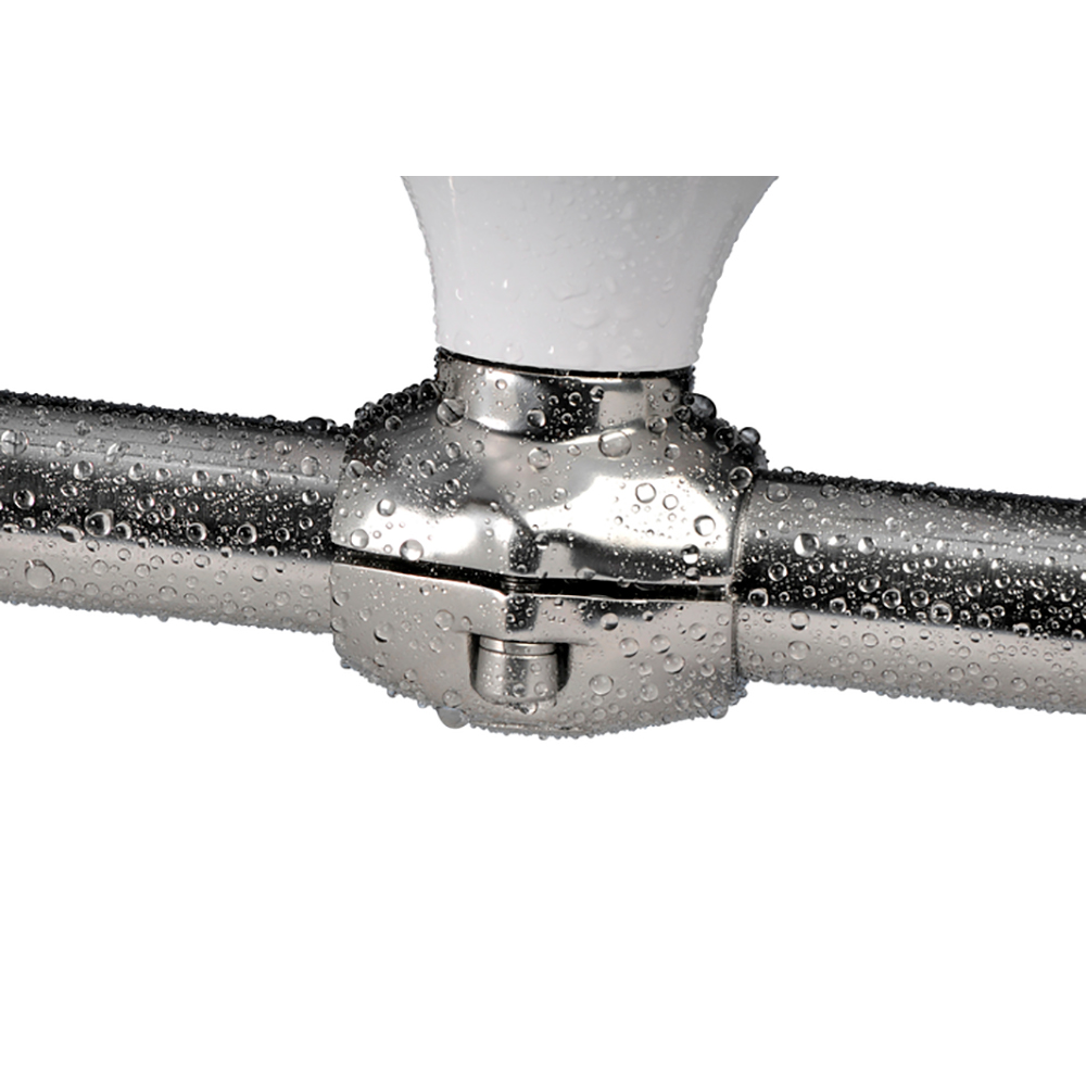 Wet shiny metal pipe connection with water droplets.