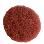 Close-up of red scrub pad texture.