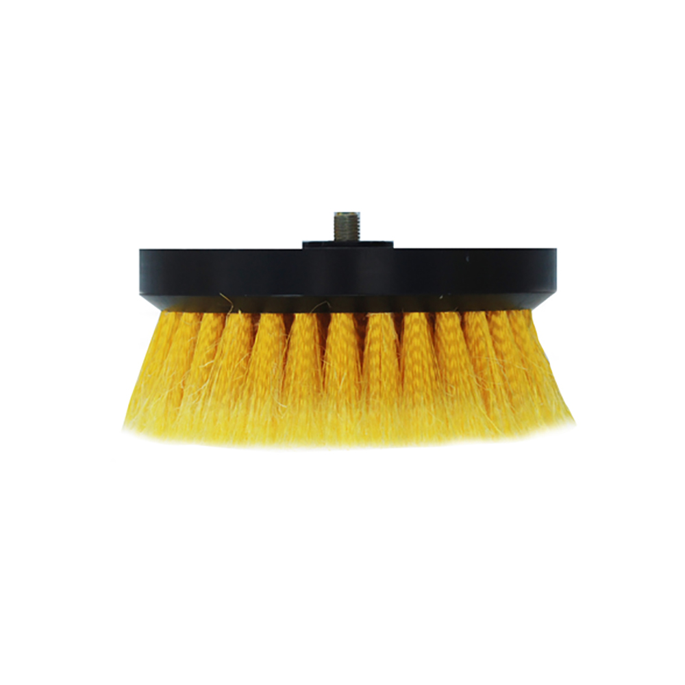 Yellow scrub brush with black holder