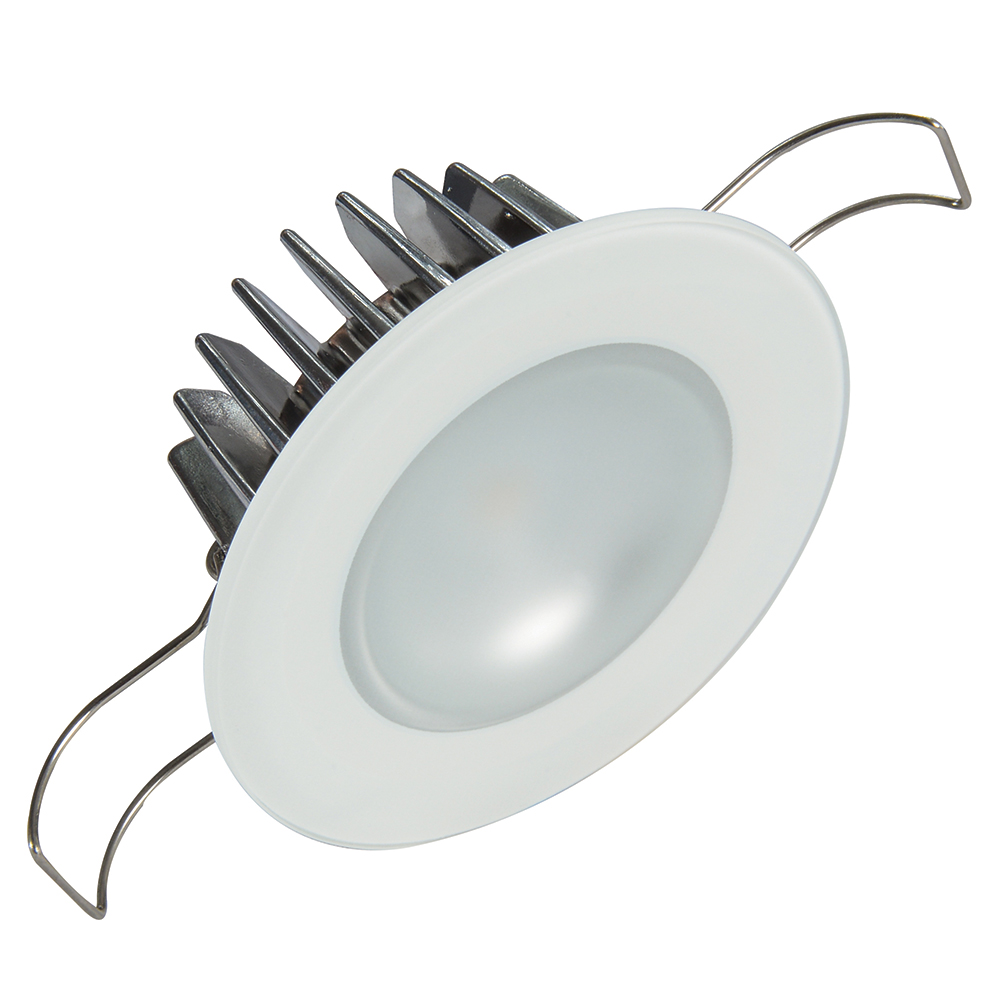 Recessed LED downlight with metal fins.