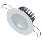 LED downlight fixture with white trim and fins