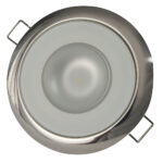 Round recessed ceiling light with stainless steel trim.