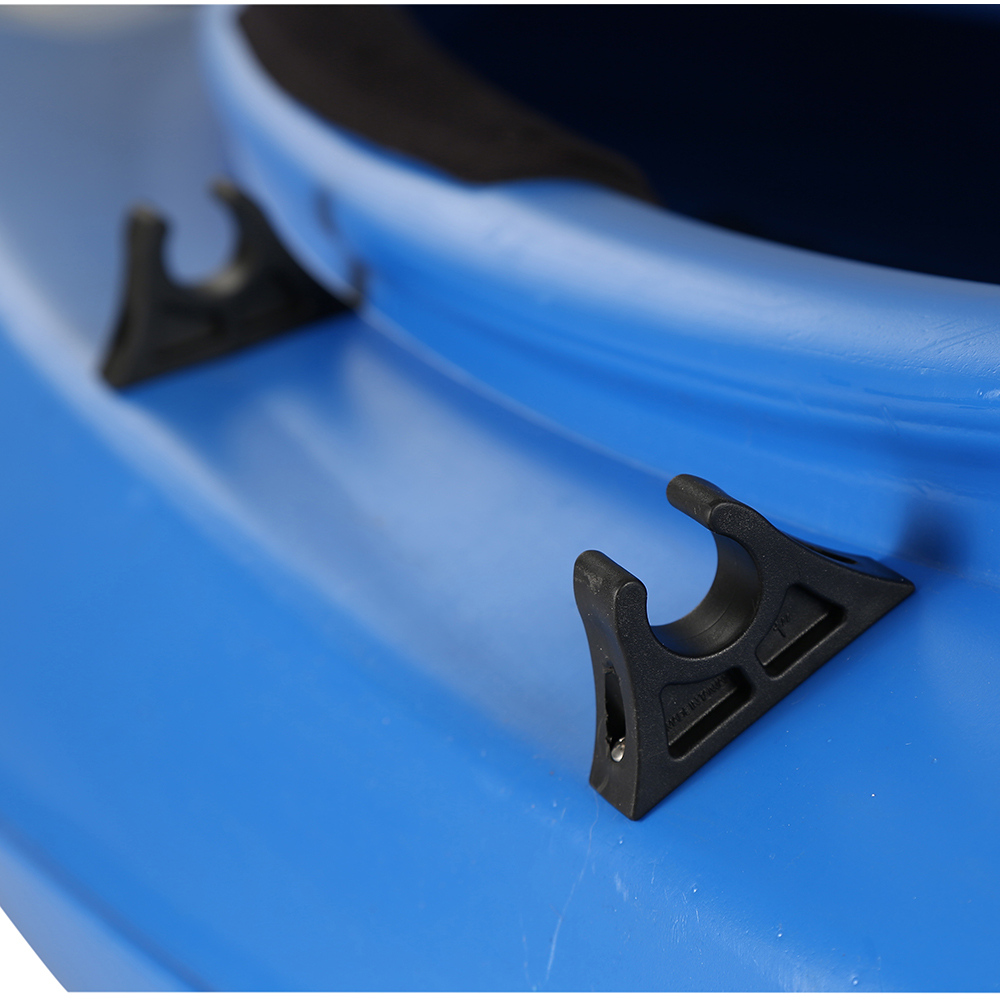 Blue kayak with paddle holders close-up