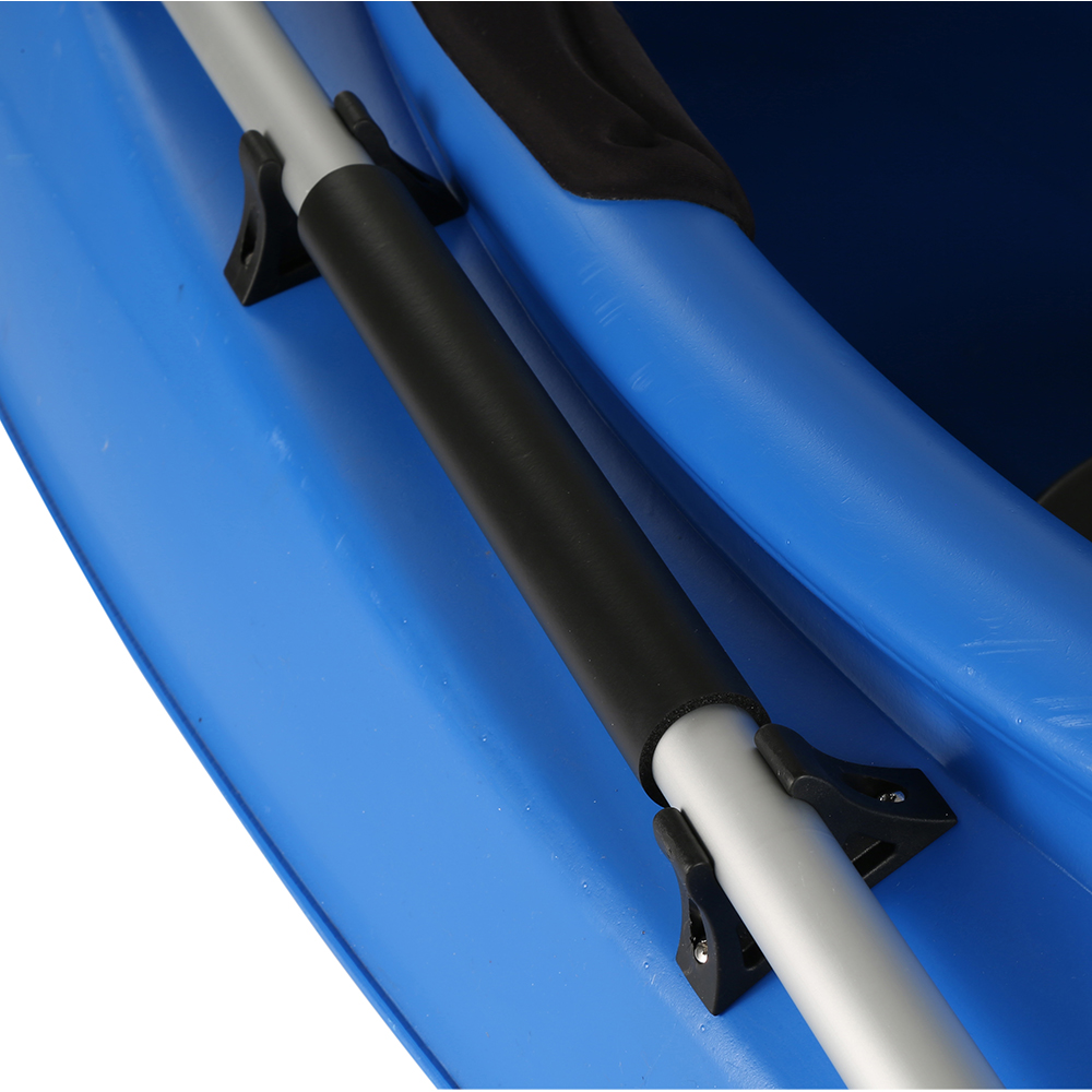 Blue kayak with paddle holder close-up.