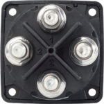 Close-up of electrical terminal block with bolts.