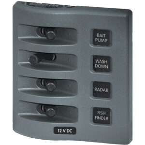 Marine circuit breaker panel with three switches.