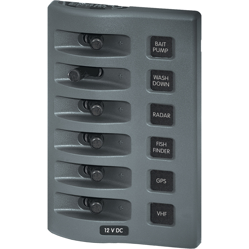 Six-switch panel with boat equipment labels.