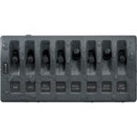 Wet marine switch panel with labeled toggles.