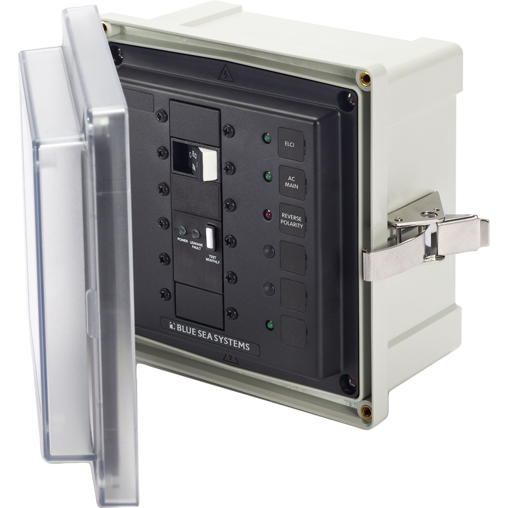 Electrical marine control panel with open cover.