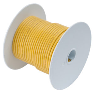 Yellow electrical wire spool, white background.
