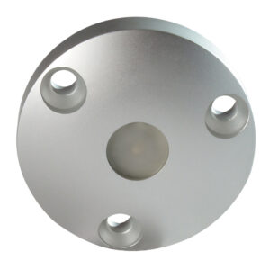 Metallic part with four circular holes