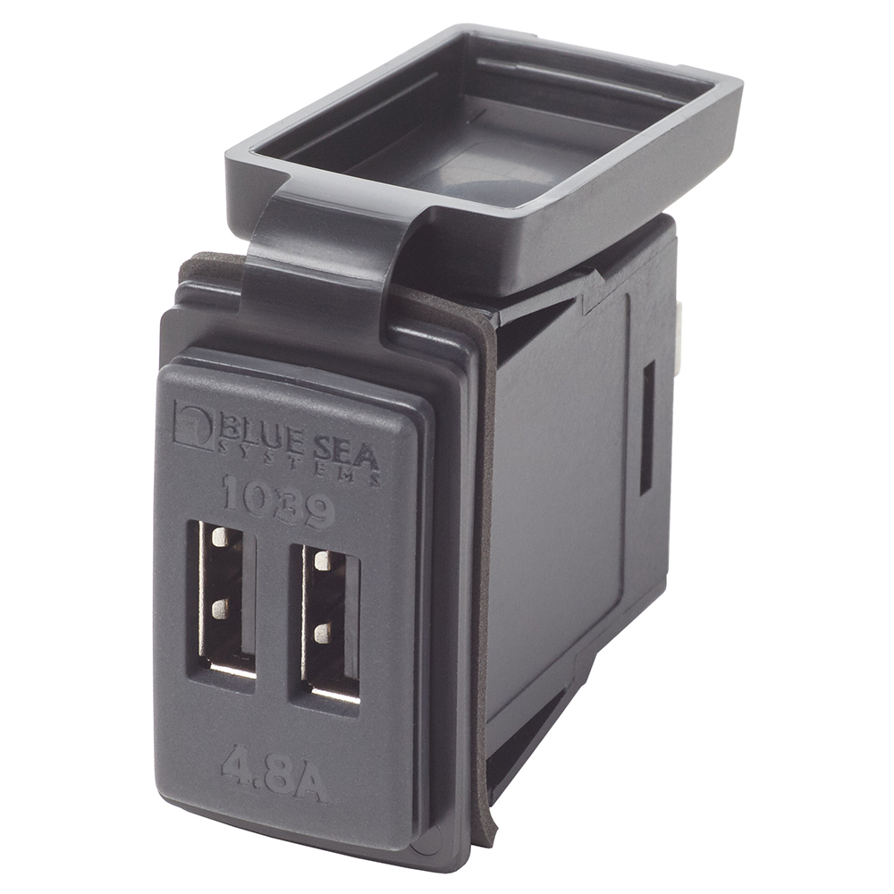 USB charger with dual ports and cover.