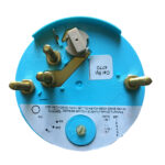 Blue mechanical tachometer for vehicle calibration.