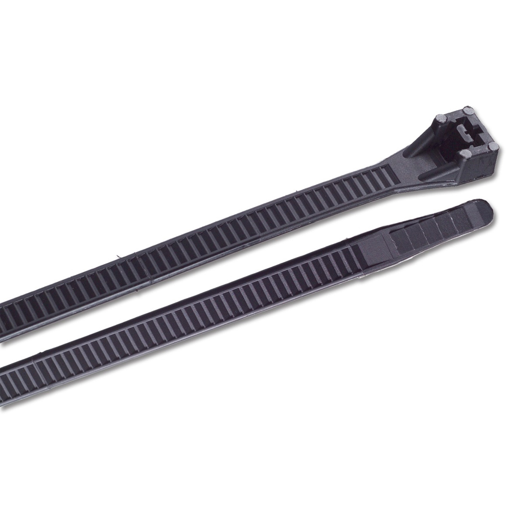 Black plastic cable ties on white background.