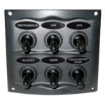 Boat switch panel with six toggle switches.