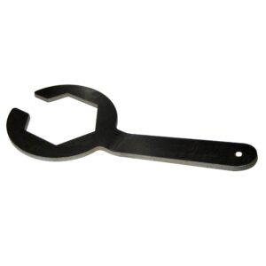 Large metal wrench on white background