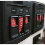 Automatic charging relay panel with switches.