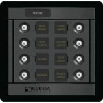 12V DC electrical panel with circuit breakers.