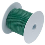 Spool of green electrical cable wire