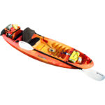 Orange kayak with paddle and gear for adventure.
