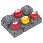 Battery switch panel with six rotary switches.