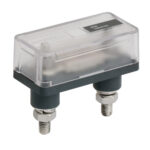 Transparent marine electrical fuse block with terminals.