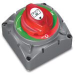 Dual battery disconnect switch in red and gray.