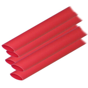 Red corrugated pipes stacked together.