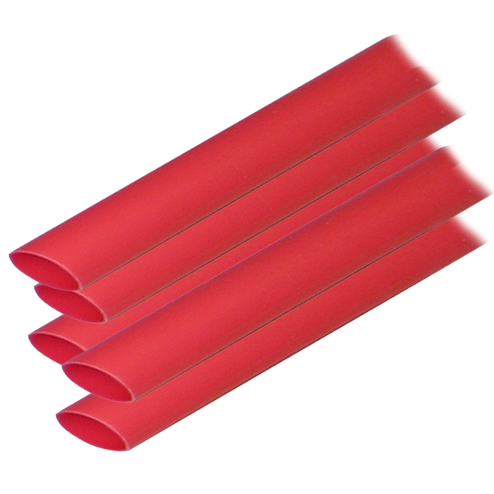 Red corrugated pipes stacked together.