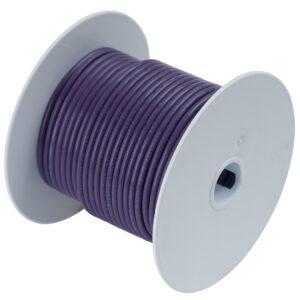 Purple electrical wire spool on white background