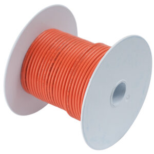 Spool of orange electrical wire.