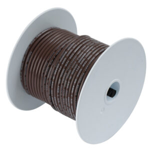 Brown wire spool, white ends, labeled text visible.