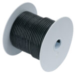 Black cable spool on white background