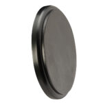 Black circular metal disc with textured surface