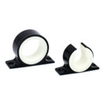 Black and white pipe clamps on display.