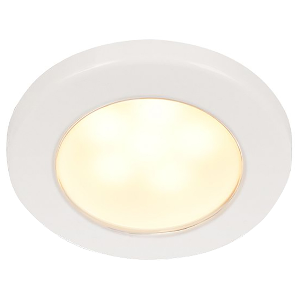 Round recessed ceiling light with white trim.