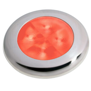 Round metal emergency stop button, glowing red center.