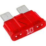 Red 10-amp car fuse, close-up view.